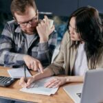 Couple Calculating all their Bills